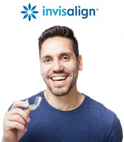 A man holding a set of invisalign braces.